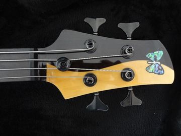 4 string bass guitar Fodera custom bass guitar Alder with flamed maple top Taiji design body MOP inlay logo supplier