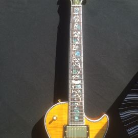 Standard LP electric guitar with gold hardware and flower inlay supplier